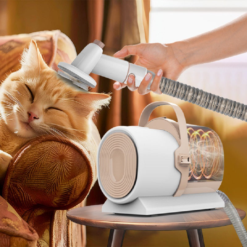 Pink pet grooming vacuum with clipper