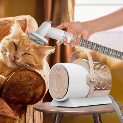 Pink pet grooming vacuum with clipper